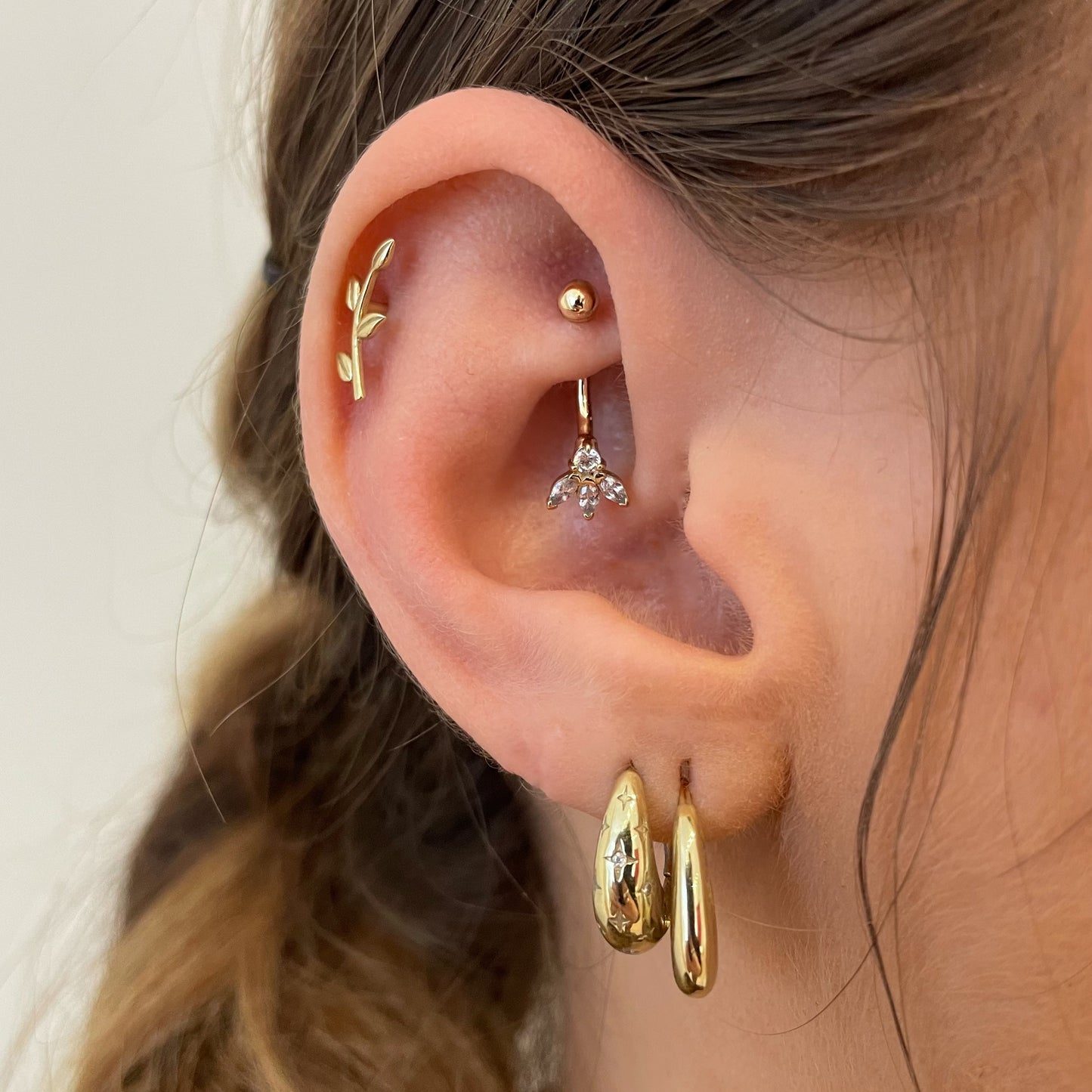 9k solid yellow gold Lotus Flower banana bar Banana Bars Laura Bond Maria Tash astrid miyu