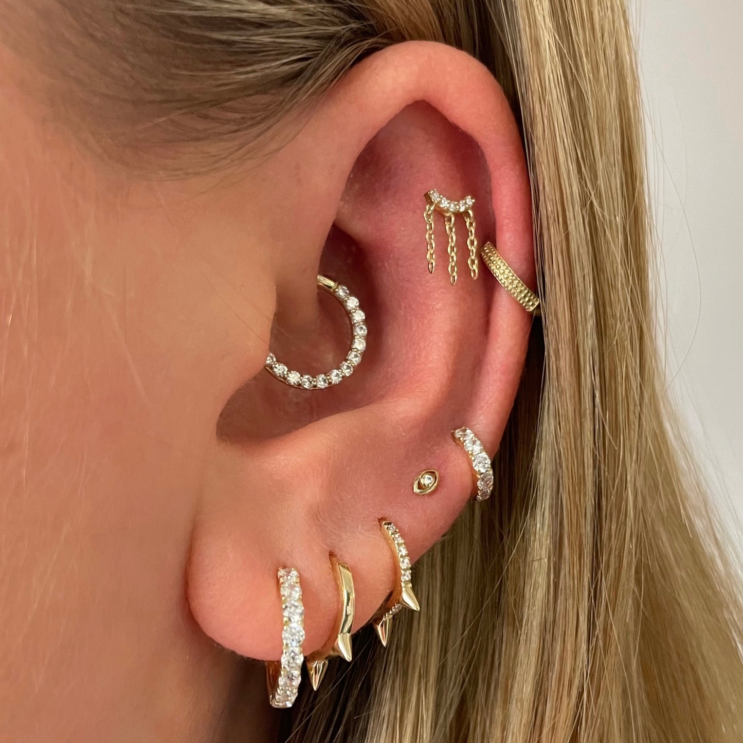 astrid miyu 9k solid yellow gold 8mm crystal spike huggie earring Huggies and Hoops Laura Bond