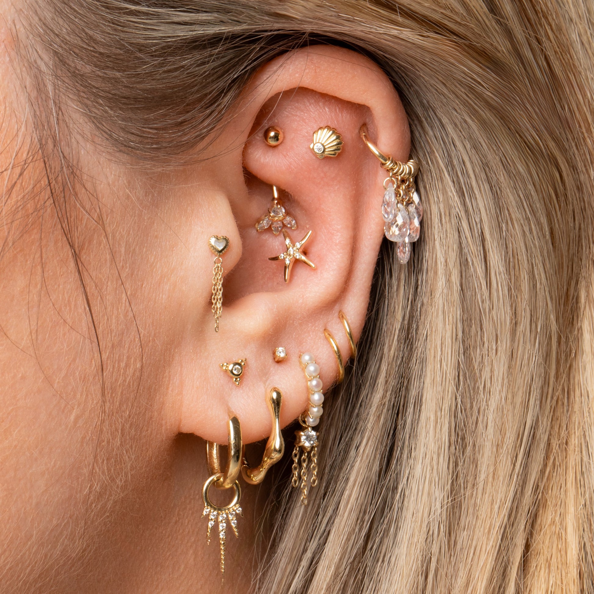 9k solid yellow gold Lotus Flower banana bar Banana Bars Laura Bond Maria Tash astrid miyu