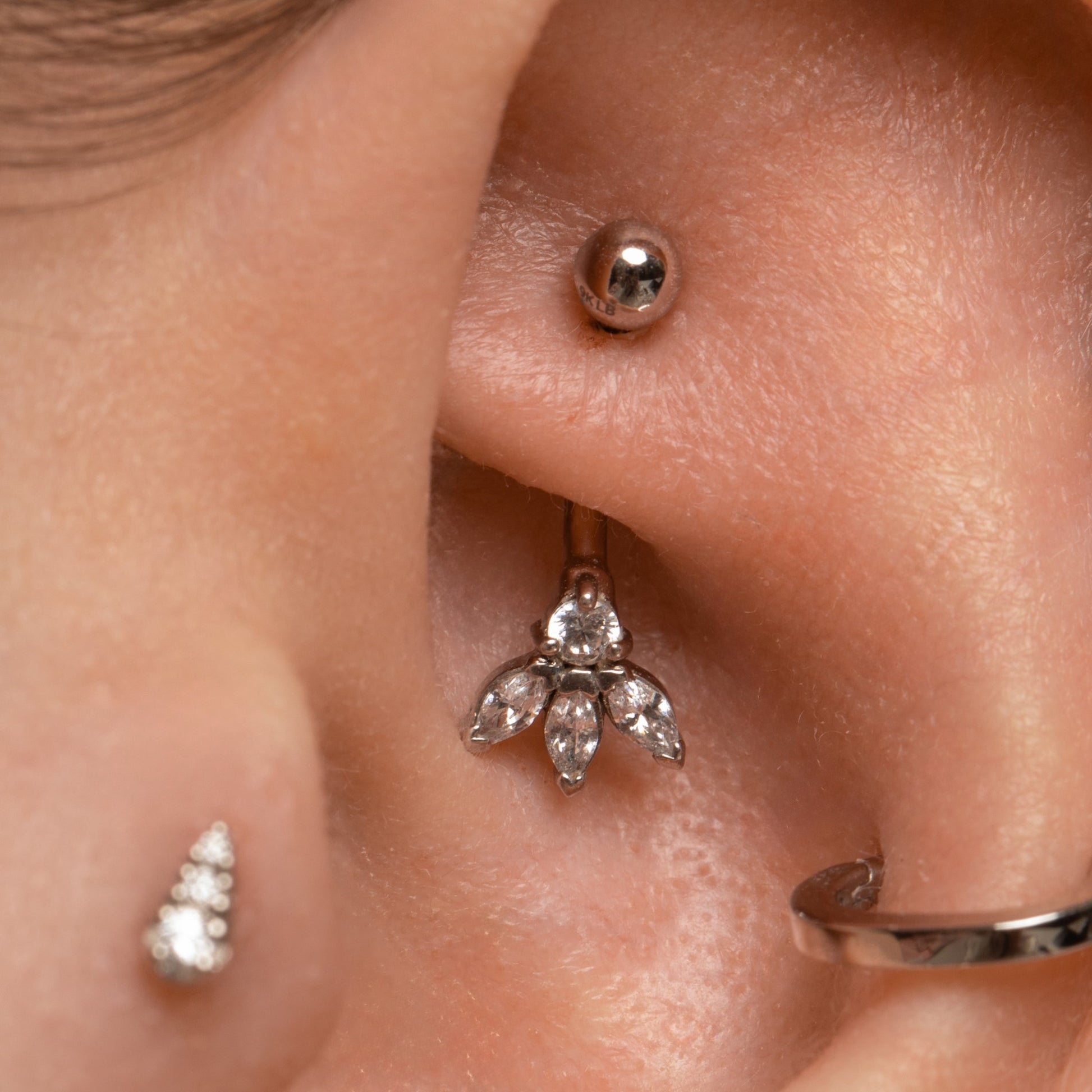 9k solid white gold Lotus Flower banana bar – Laura Bond