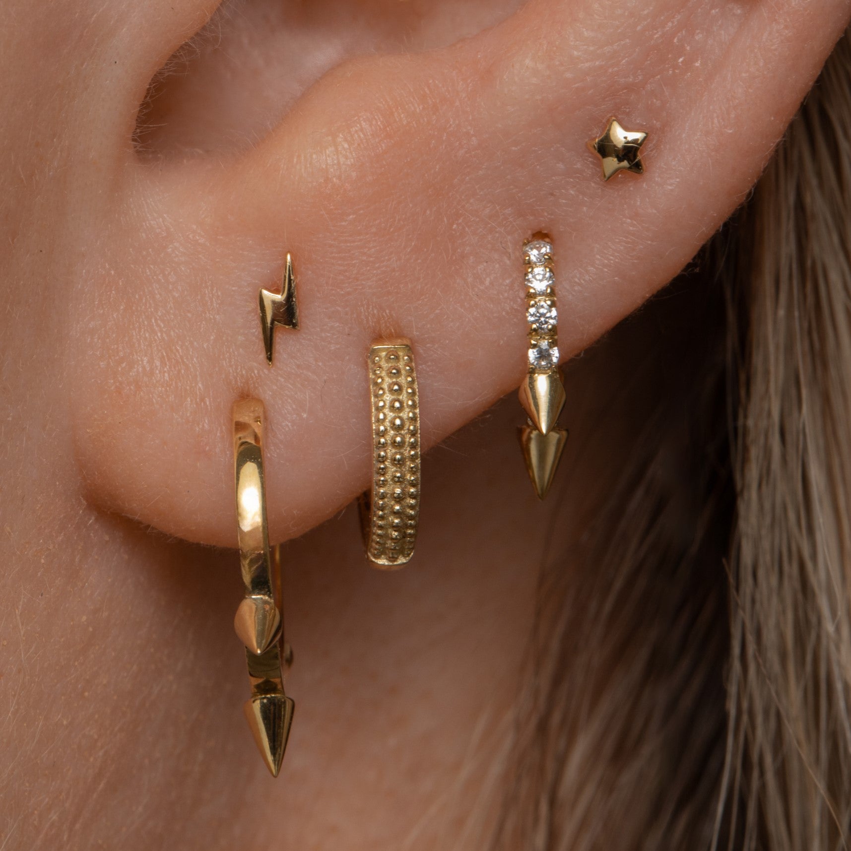 9k solid yellow gold 10mm plain spike huggie earring pair Earring Pairs Laura Bond Maria Tash astrid miyu