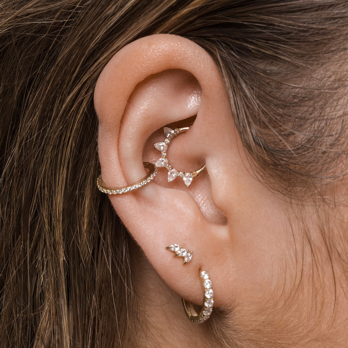 astrid miyu 14k solid yellow gold 9mm Dreamer pear cut hoop for daith or septum Laura Bond