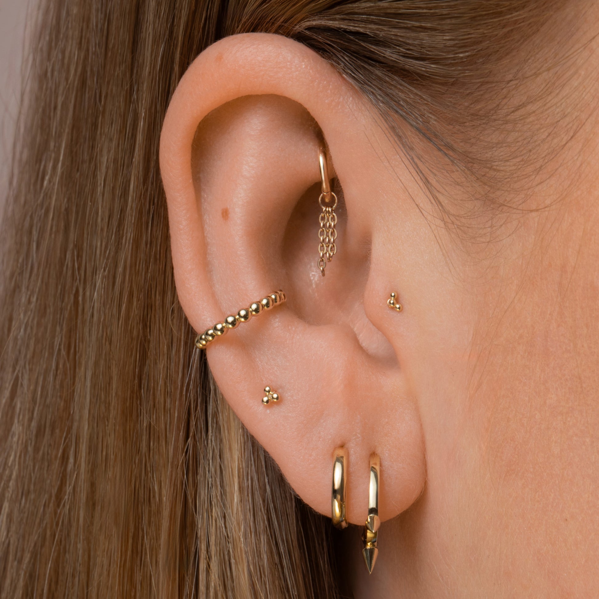 9k solid yellow gold simple huggie earring Huggies and Hoops Laura Bond Maria Tash