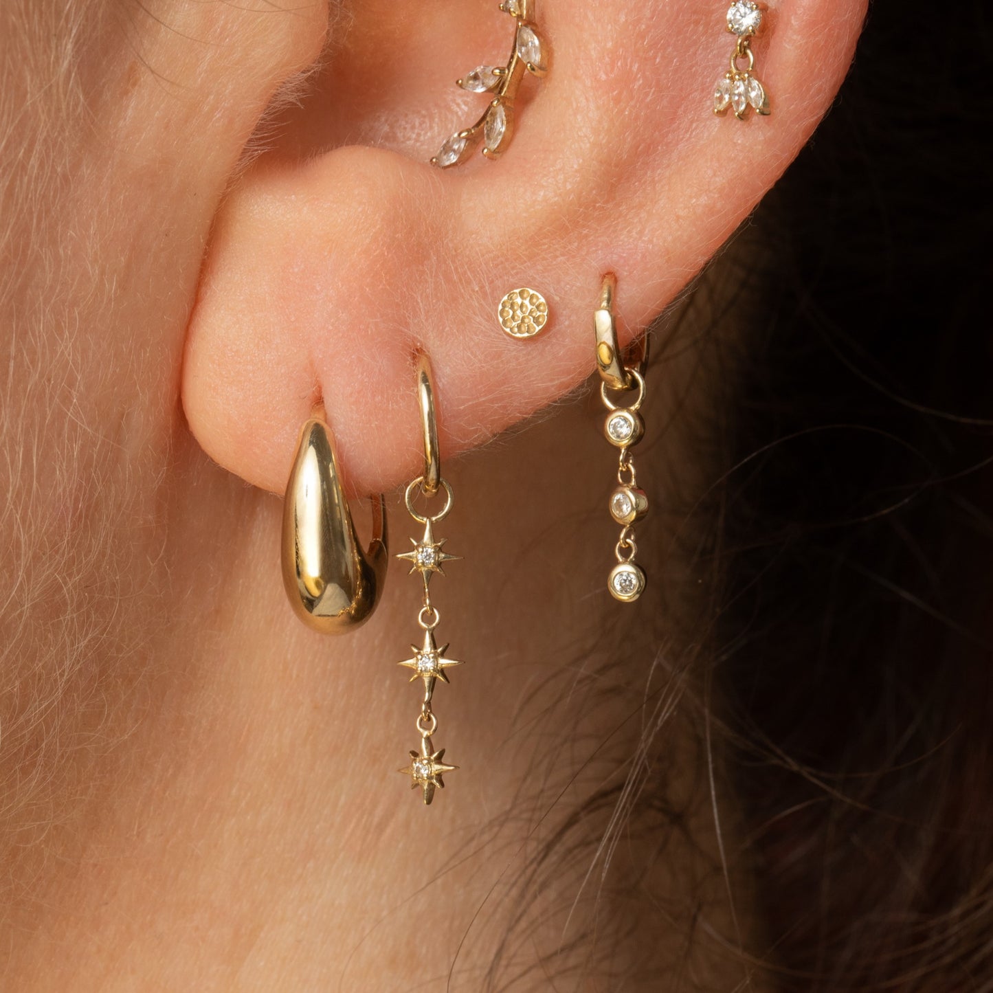 9k solid yellow gold 6mm 16g clicker hoop earring with North Star charm