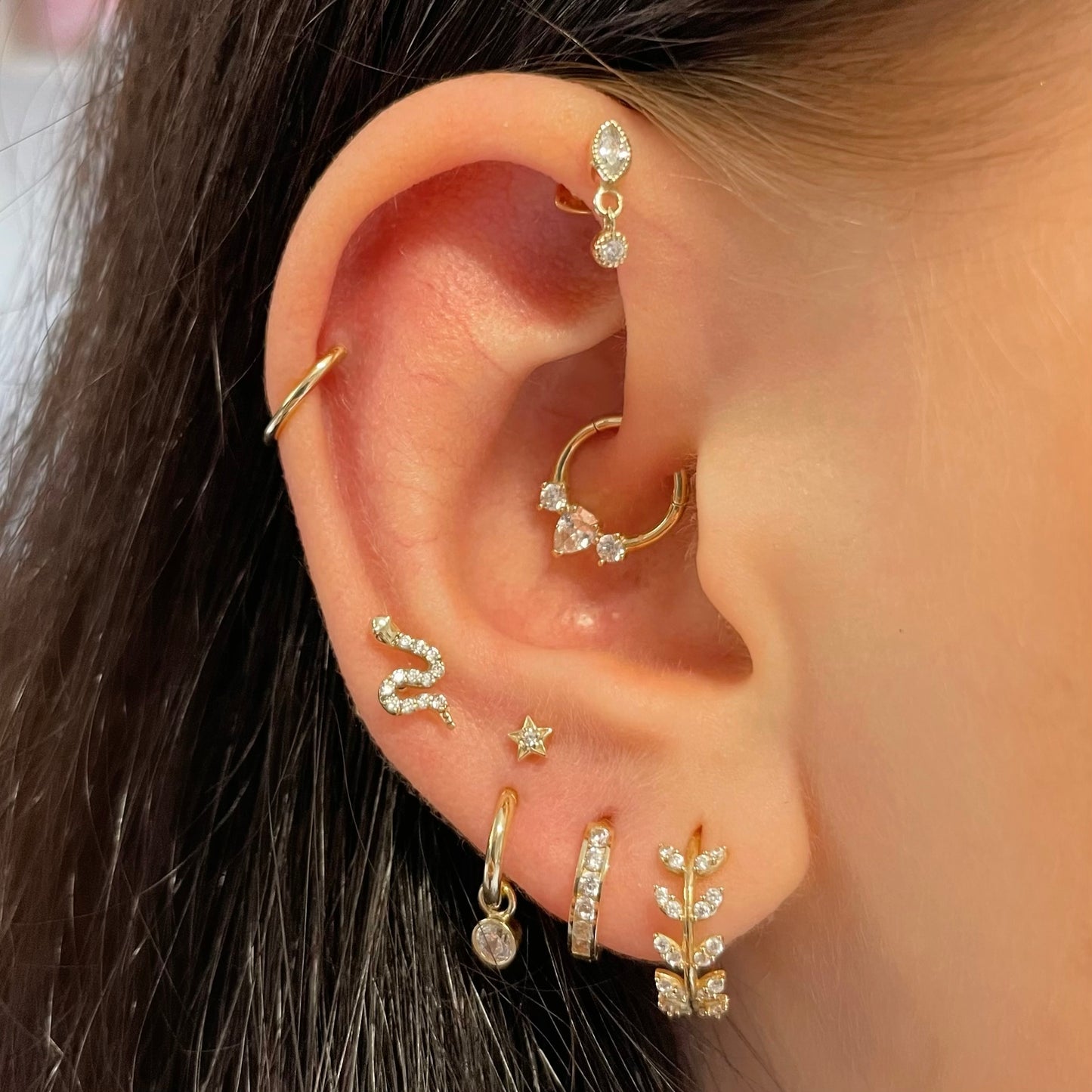 9k solid yellow gold Aphrodite vine leaf huggie earring pair