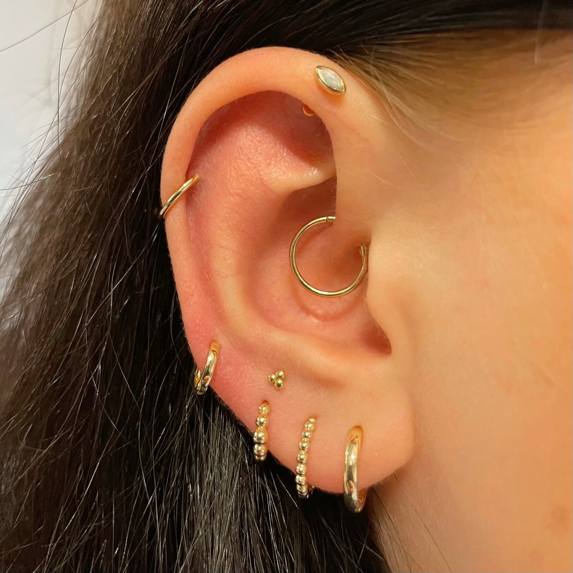 14k solid yellow gold 10mm 16g clicker hoop earring Huggies and Hoops Laura Bond Maria Tash