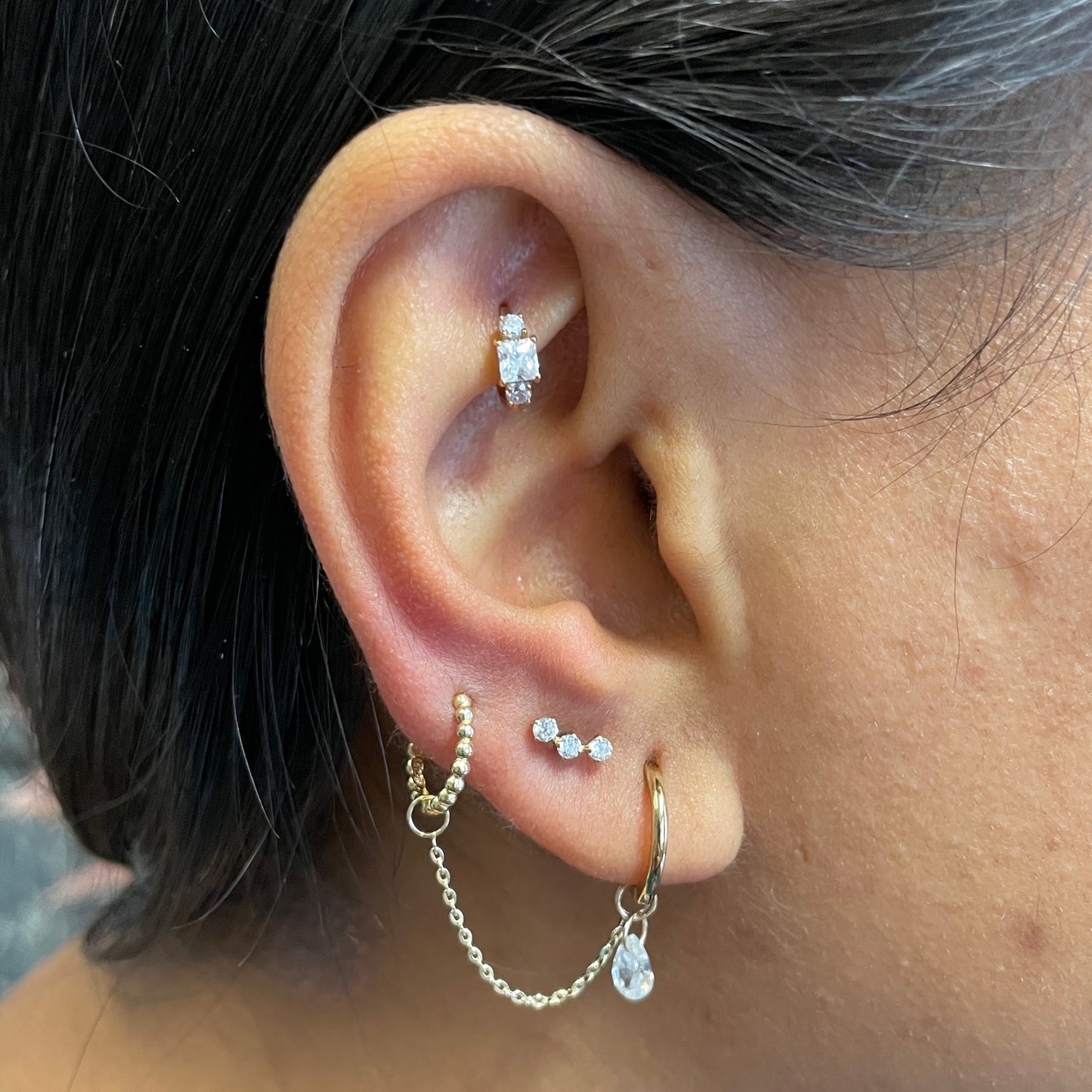 9k solid yellow gold 10mm slim simple huggie earring Huggies and Hoops Laura Bond Maria Tash