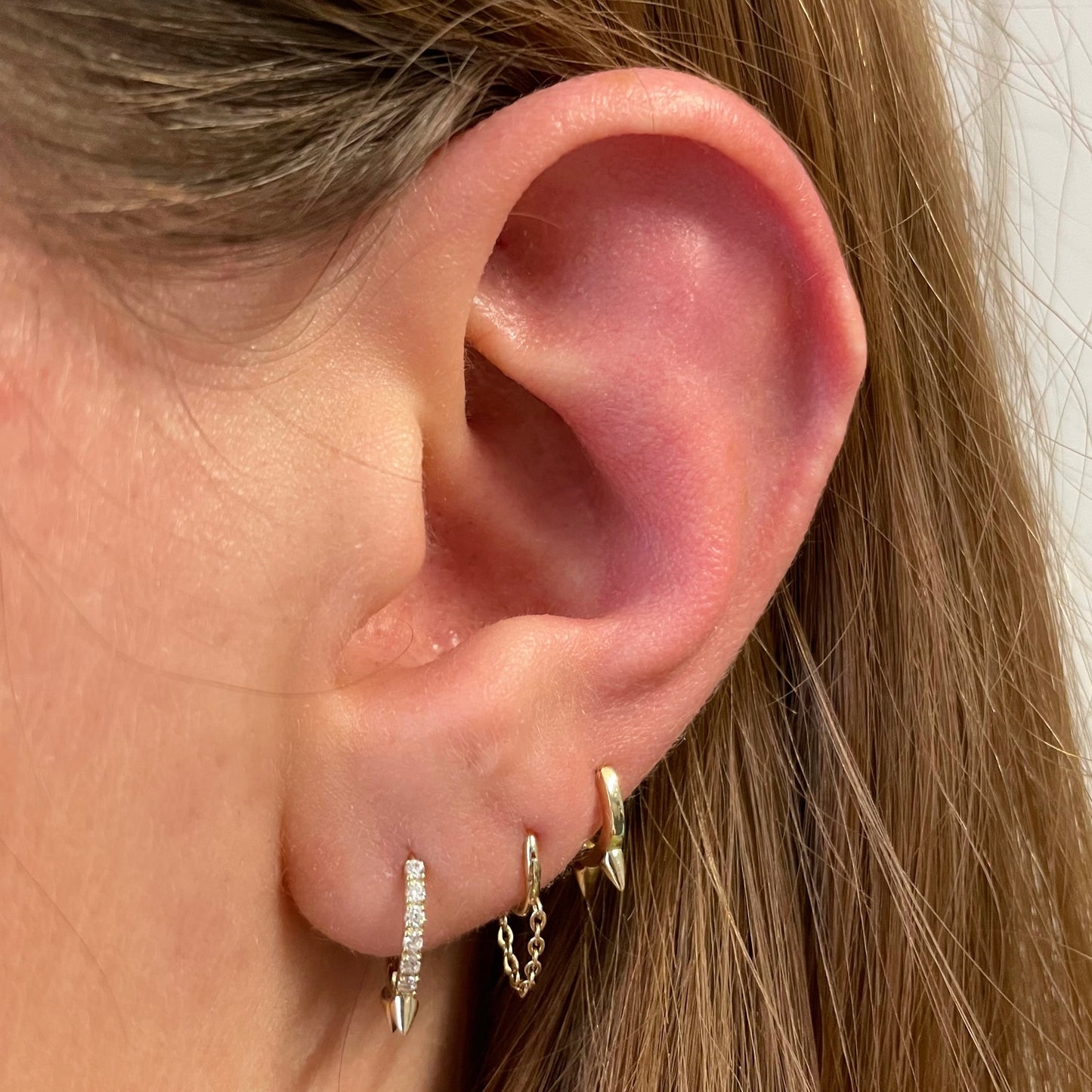9k solid yellow gold 10mm crystal spike huggie earring pair Earring Pairs Laura Bond Maria Tash