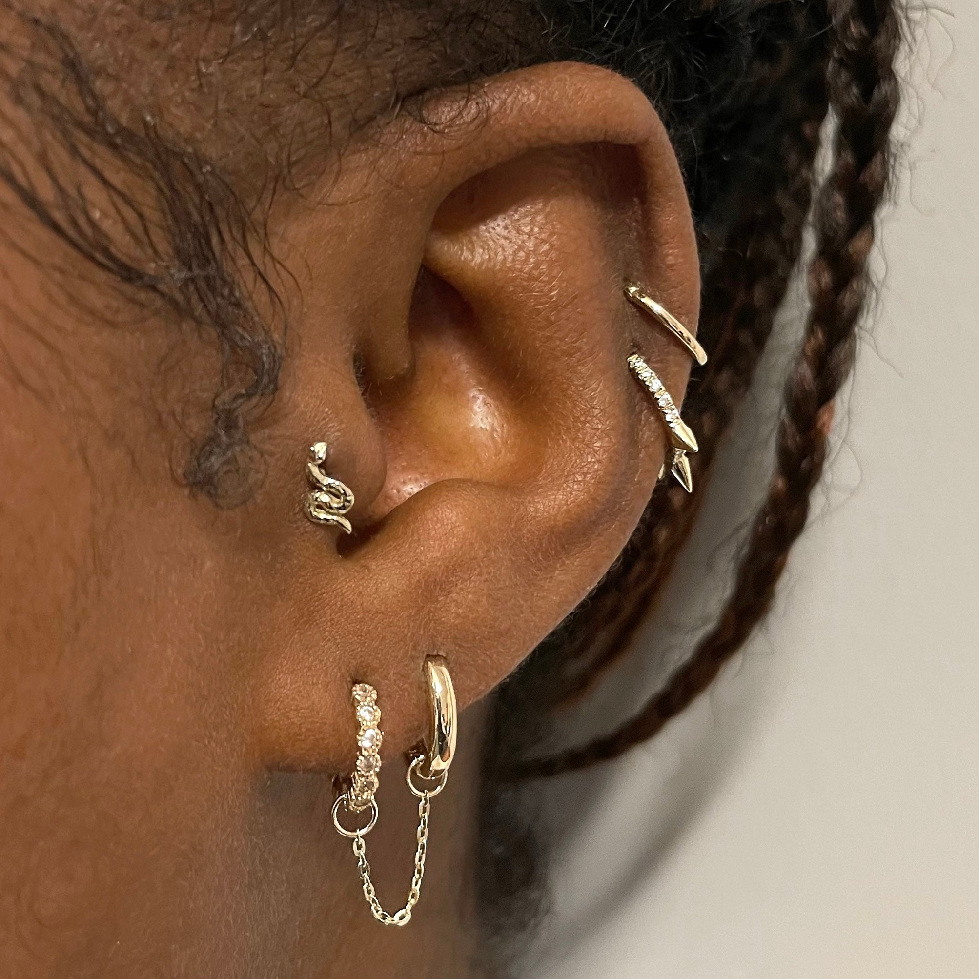 14k solid yellow gold tiny textured serpent flat back labret stud earr Laura Bond