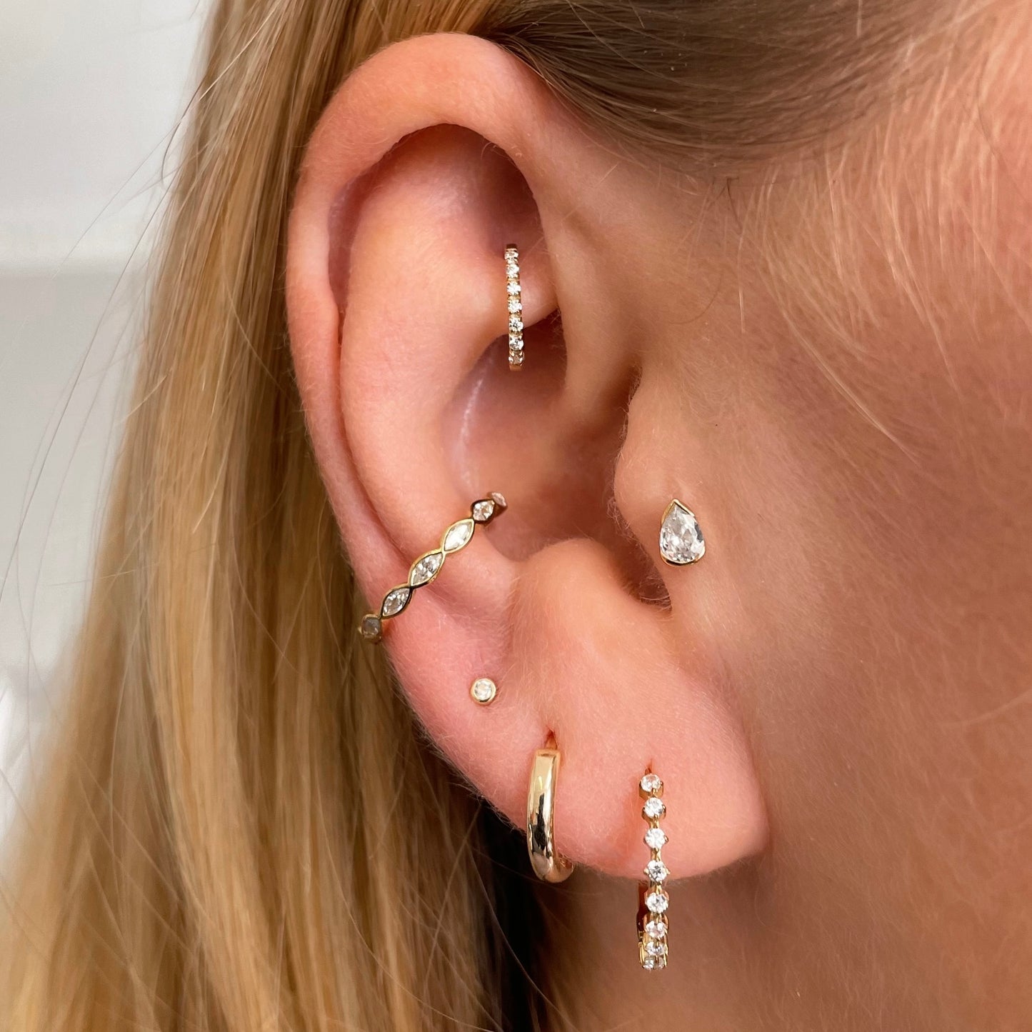 9k solid yellow gold 7mm 16g crystal oval rook clicker hoop Huggies and Hoops Laura Bond Maria Tash astrid miyu
