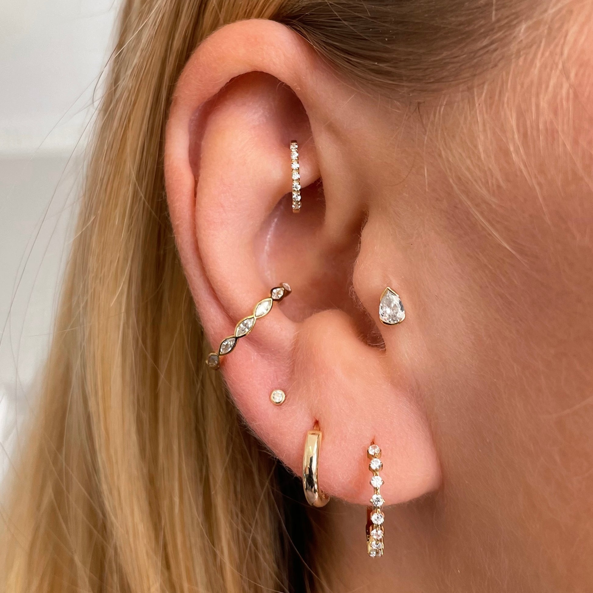 9k solid yellow gold 7mm 16g crystal oval rook clicker hoop Huggies and Hoops Laura Bond Maria Tash astrid miyu