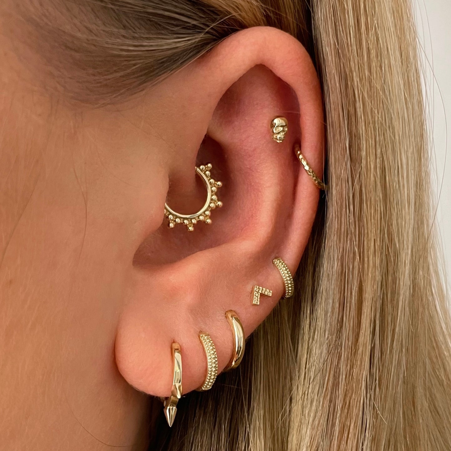 9k solid yellow gold mini bobble huggie earring